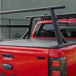 Rear view of Ford Ranger with EGR RollTrac cover and adjustable ladder racks.